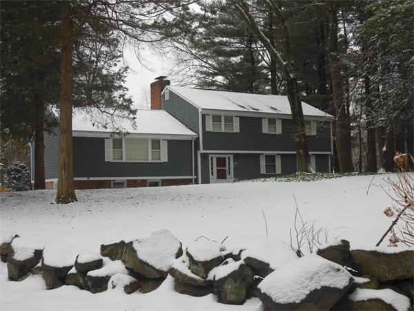 26 Suzanne Road Lexington, MA 02420 - Photo 11 of 11 a backyard of a house with fire pit and outdoor seating