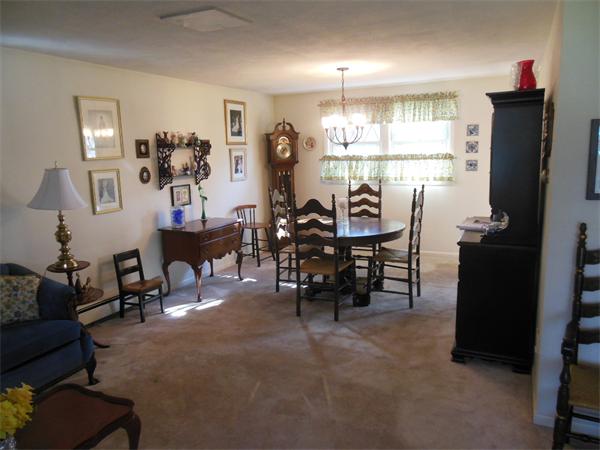 26 Suzanne Road Lexington, MA 02420 - Photo 3 of 11 a view of a dining room with furniture