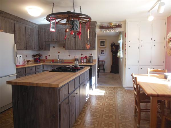 26 Suzanne Road Lexington, MA 02420 - Photo 4 of 11 a kitchen that has a lot of cabinets in it