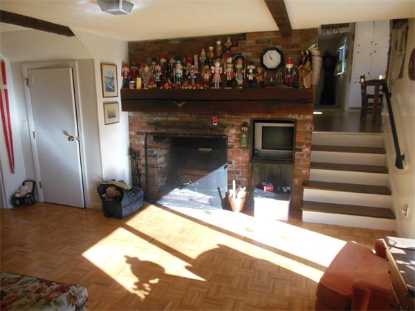 26 Suzanne Road Lexington, MA 02420 - Photo 6 of 11 a view of hall way with furniture and fireplace