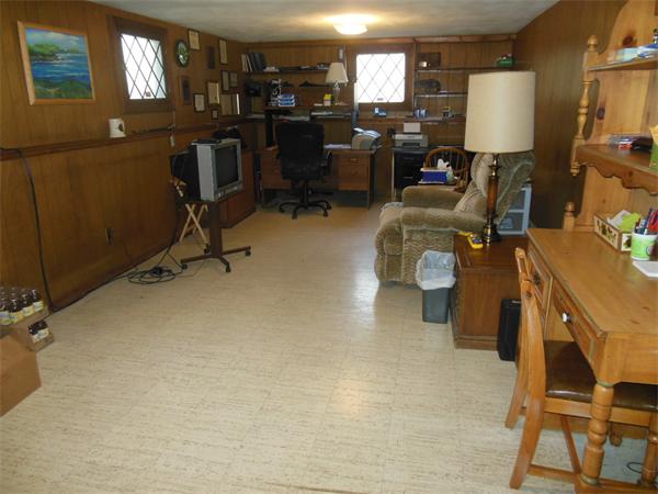 26 Suzanne Road Lexington, MA 02420 - Photo 8 of 11 a view of a workspace with furniture and a window