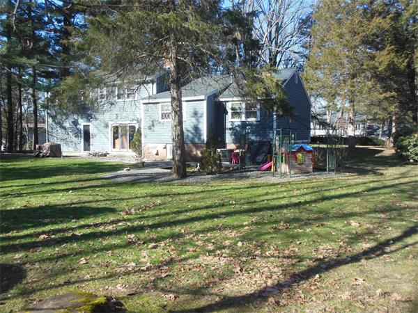 26 Suzanne Road Lexington, MA 02420 - Photo 10 of 11 a view of a park with large trees