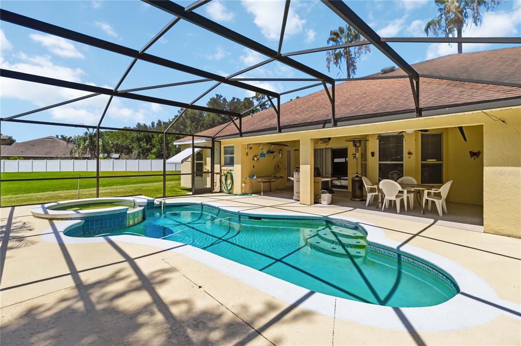 3225 Canoe Creek Road St. Cloud, FL 34772 - Photo 28 of 30 a view of a swimming pool with a patio