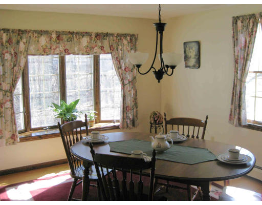 40 Spaulding Road Chelmsford, MA 01824 - Photo 3 of 11 a view of a dining room with furniture and window