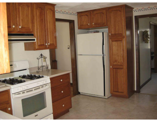40 Spaulding Road Chelmsford, MA 01824 - Photo 5 of 11 a kitchen with stainless steel appliances granite countertop a refrigerator stove and a sink