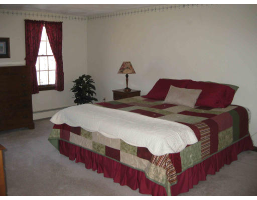 40 Spaulding Road Chelmsford, MA 01824 - Photo 6 of 11 a bedroom with bed and window