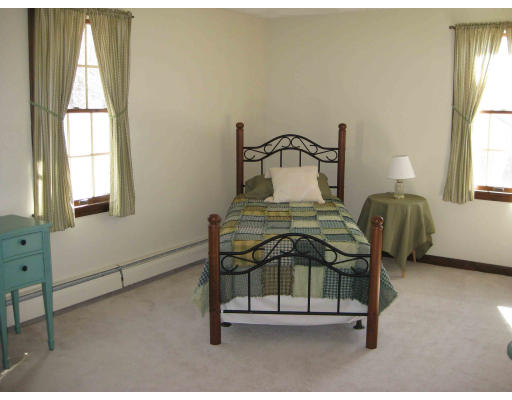 40 Spaulding Road Chelmsford, MA 01824 - Photo 7 of 11 a room with a table chair and windows
