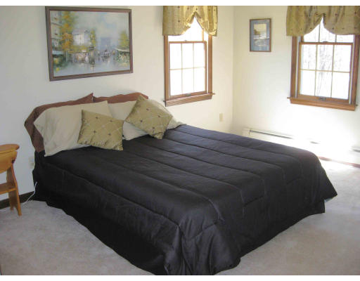 40 Spaulding Road Chelmsford, MA 01824 - Photo 8 of 11 a bedroom with a bed and window