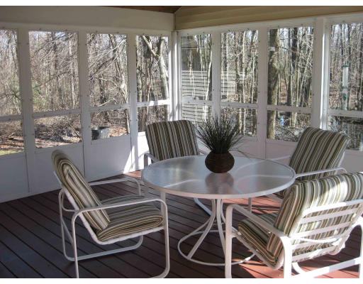 40 Spaulding Road Chelmsford, MA 01824 - Photo 10 of 11 a view of a dining room with furniture and chandelier