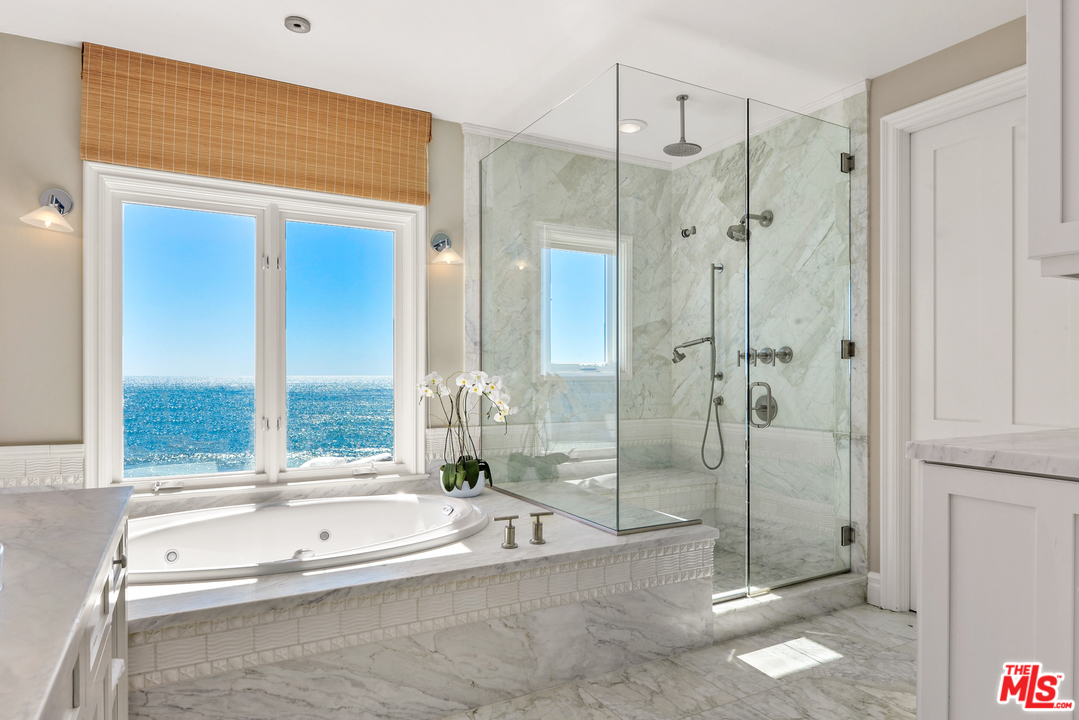 31412 Broad Beach Road Malibu, CA 90265 - Photo 21 of 43 a bathroom with a tub and a shower