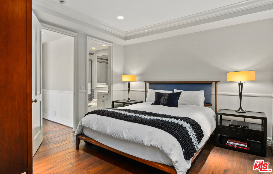 31412 Broad Beach Road Malibu, CA 90265 - Photo 32 of 43 a bedroom with a bed and a lamp