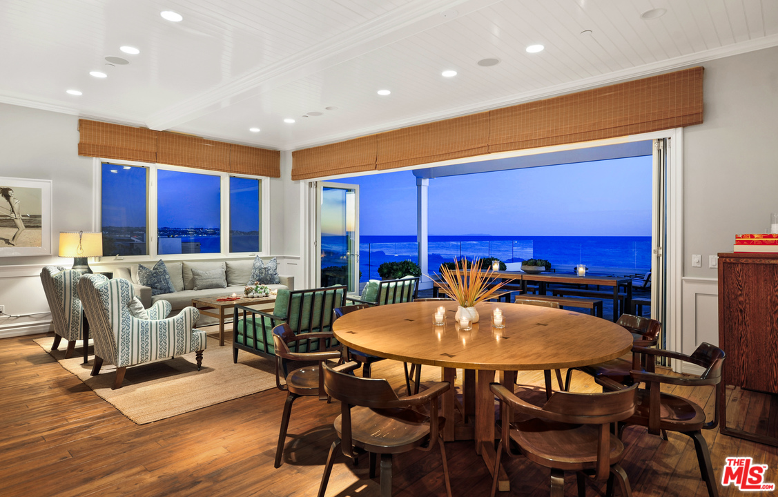 31412 Broad Beach Road Malibu, CA 90265 - Photo 36 of 43 a view of a dining room with furniture window and wooden floor