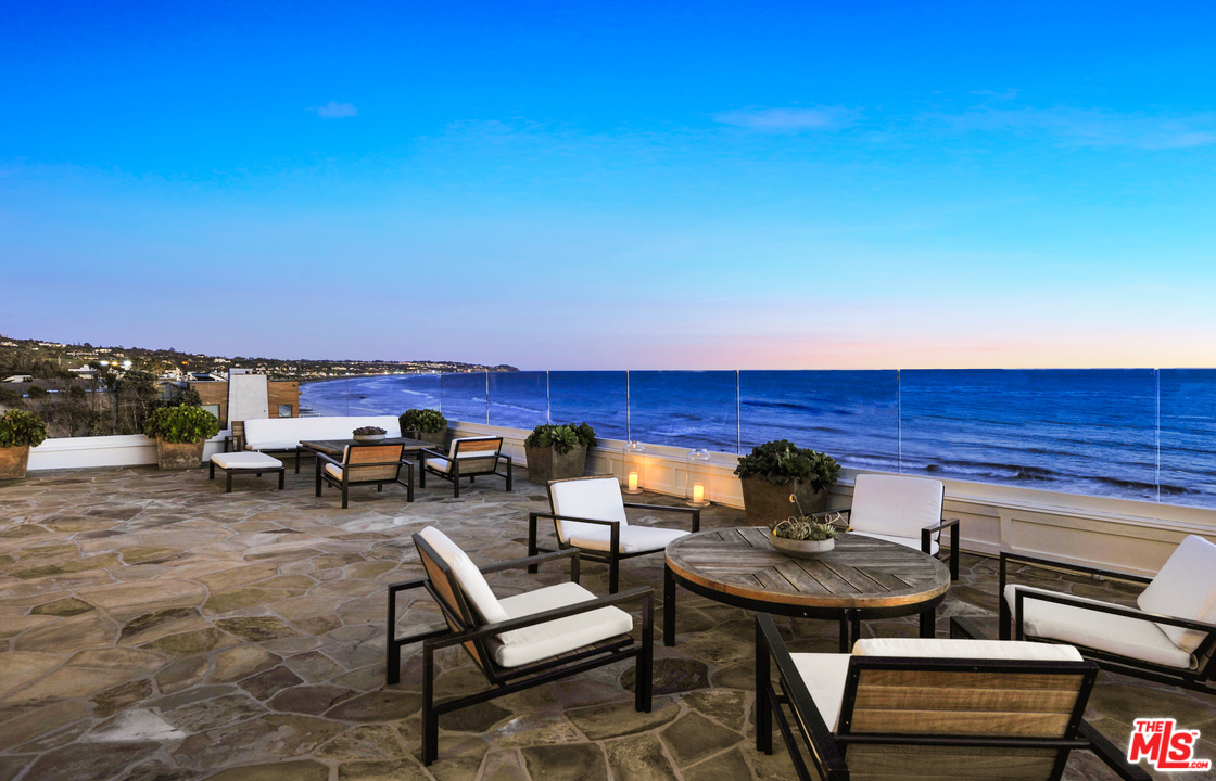 31412 Broad Beach Road Malibu, CA 90265 - Photo 37 of 43 a view of a chairs and table in patio