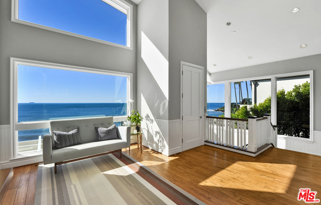 31412 Broad Beach Road Malibu, CA 90265 - Photo 5 of 43 a living room with furniture and a wooden floor