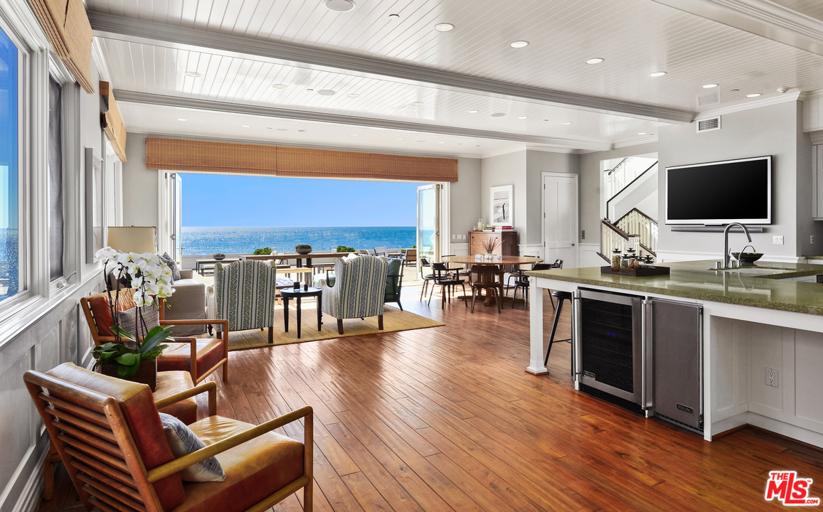 31412 Broad Beach Road Malibu, CA 90265 - Photo 6 of 43 a living room with furniture kitchen view and a large window