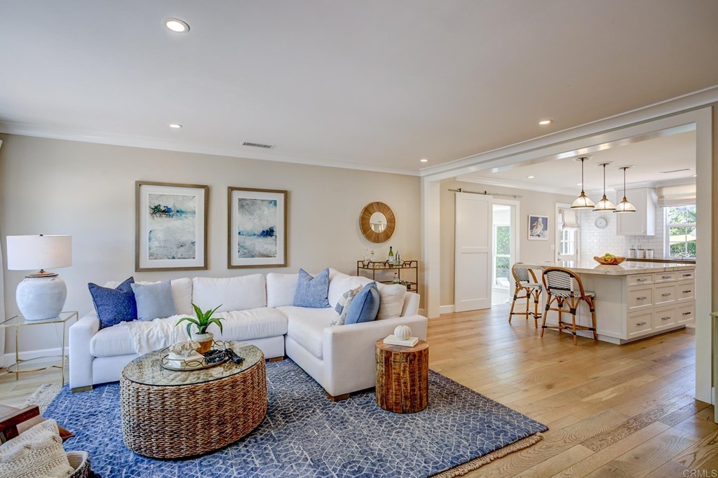 a living room with furniture and a table