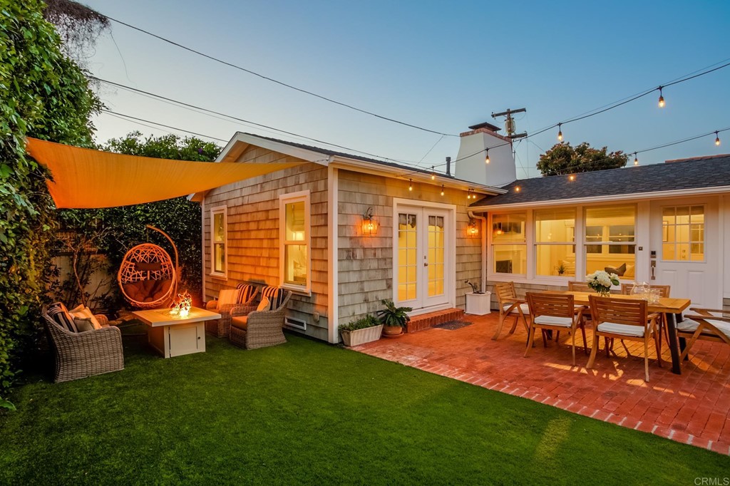 7936 Paseo Del Ocaso La Jolla, CA 92037 - Photo 35 of 43 a view of a chairs and table in patio