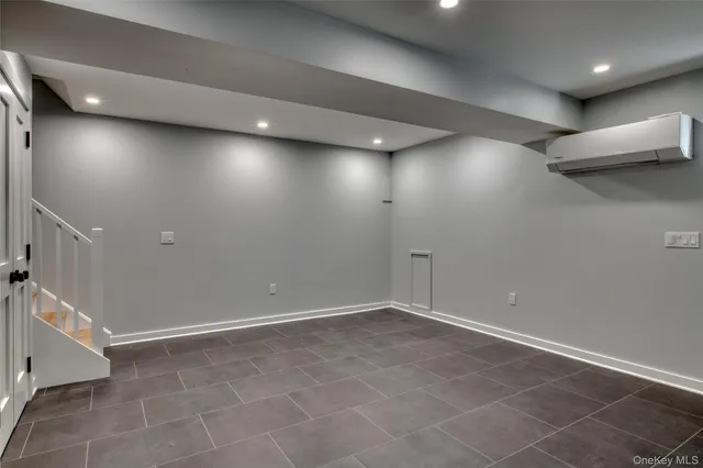 a view of a livingroom with furniture and a kitchen