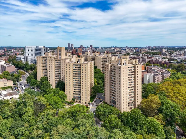 a view of a city with tall buildings