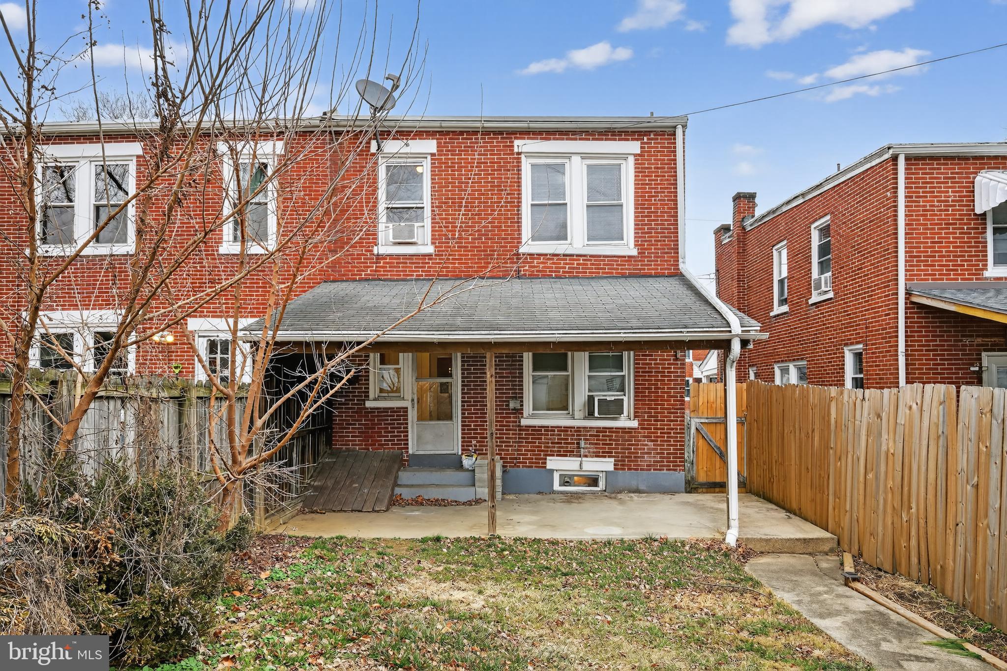 108 South Pearl Street Lancaster, PA 17603 - Photo 27 of 30 a view of a house with wooden fence and two windows
