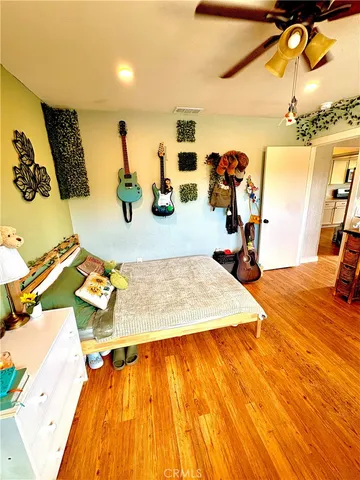 a bed room with a bed and a couch