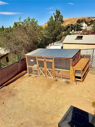 a view of a balcony with furniture