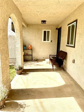 a view of living room filled with furniture