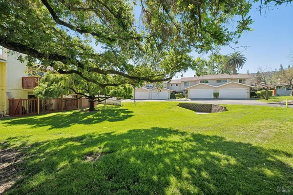 a view of a house with a big yard