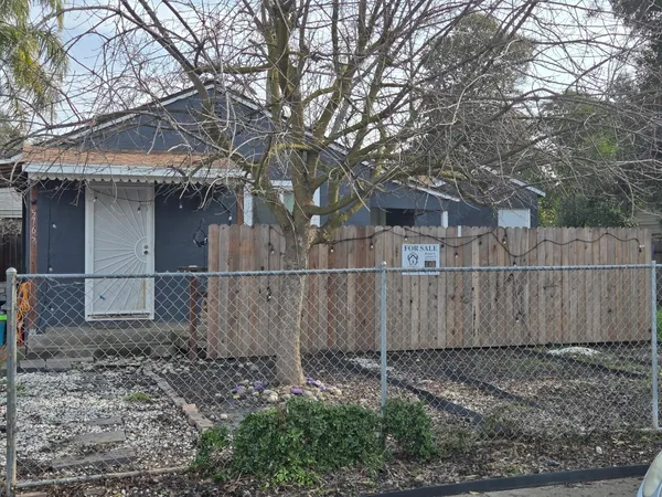 a view of a wooden fence
