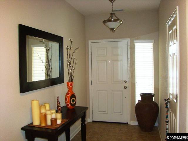 521 Needles Court Reno, NV 89521 - Photo 2 of 9 a front view of a house with entryway