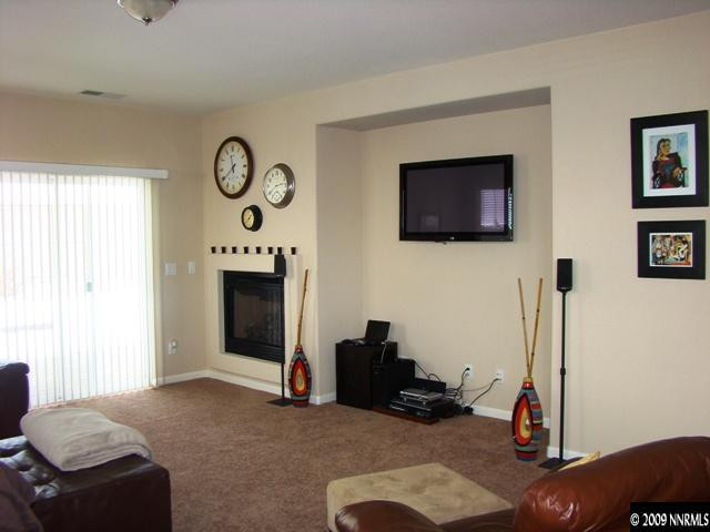 521 Needles Court Reno, NV 89521 - Photo 4 of 9 a bedroom with bed and a window