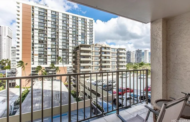 a view of balcony with furniture