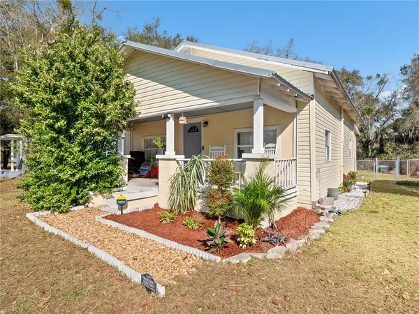 front view of a house with a patio