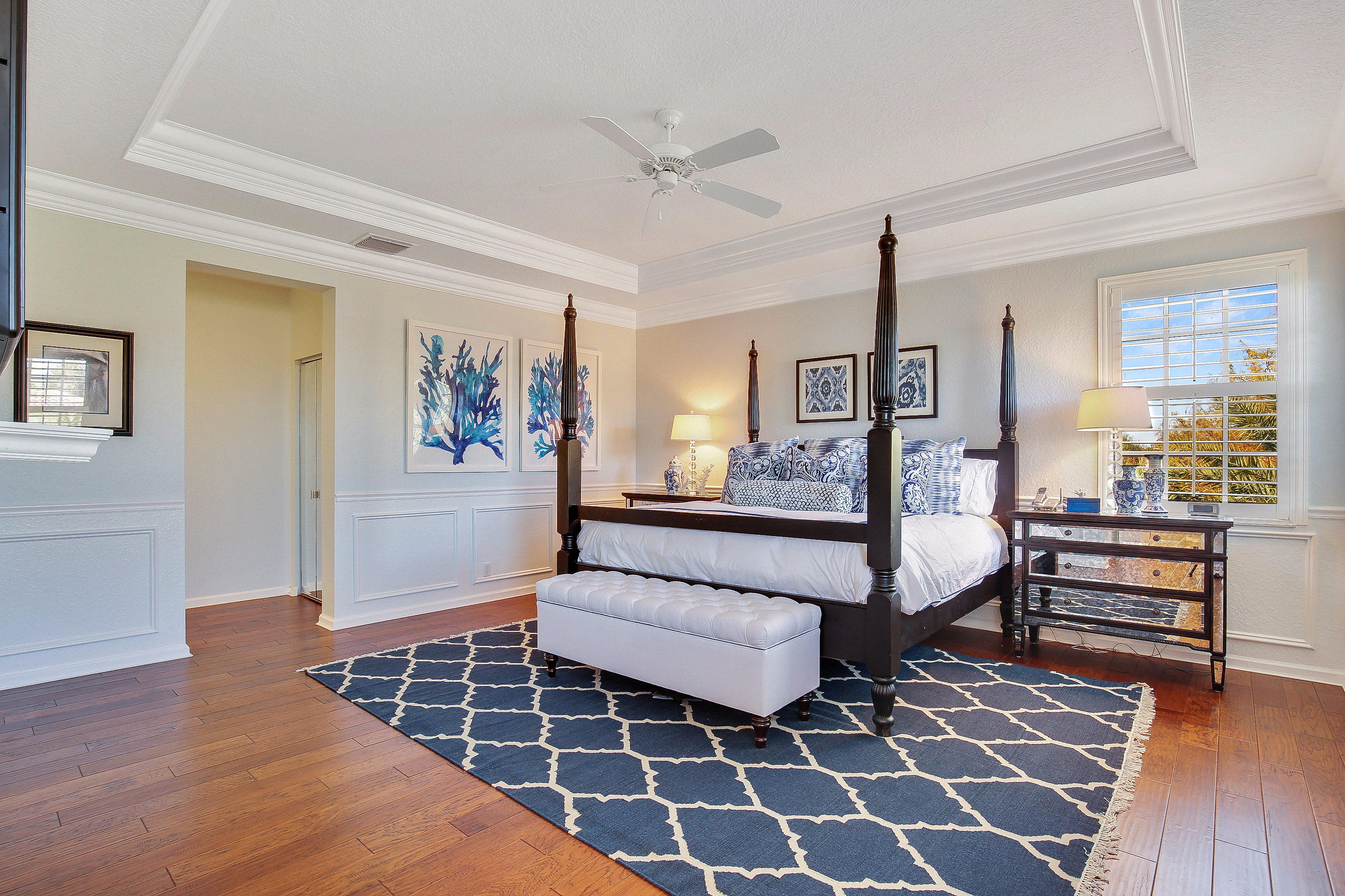 182 Via Veracruz Jupiter, FL 33458 - Photo 12 of 23 a spacious bedroom with a bed and a walk in closet