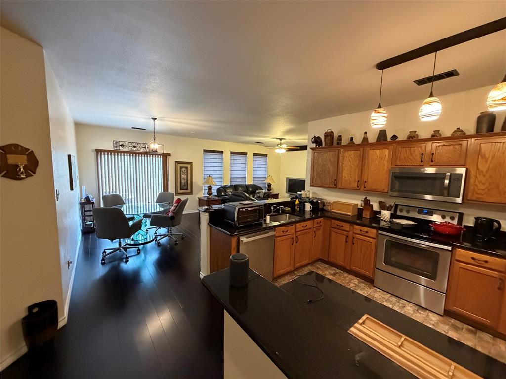 2531 Quail Ridge Road Melissa, TX 75454 - Photo 13 of 29 a kitchen with lots of counter top space