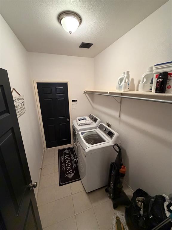 2531 Quail Ridge Road Melissa, TX 75454 - Photo 6 of 29 a utility room with dryer and washer
