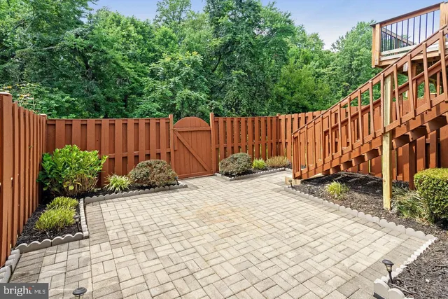 a view of a backyard with garden