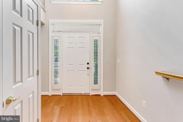 a view of a house with wooden deck