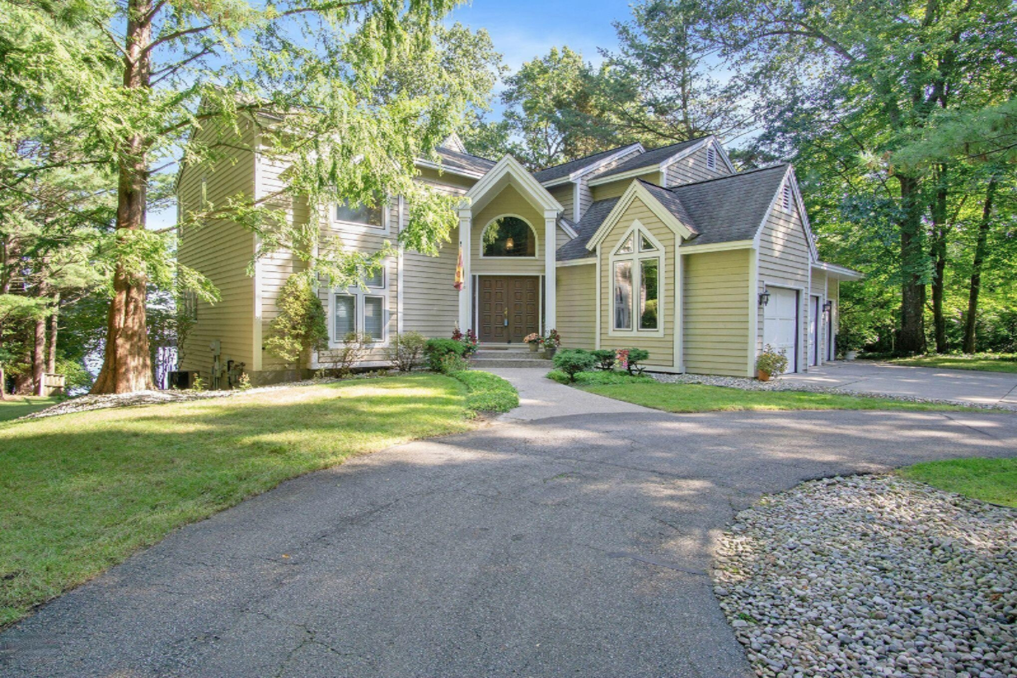18887 North Fruitport Road Spring Lake, MI 49456 - Photo 2 of 68 front 1