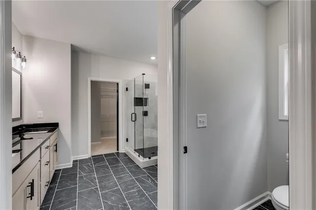 a bathroom with a bathtub sink and toilet
