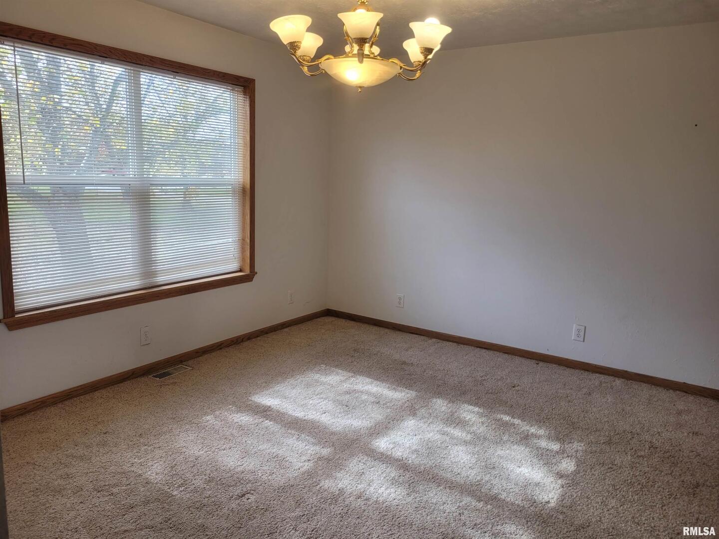 103 East Highline Road Woodlawn, IL 62898 - Photo 13 of 36 a view of an empty room with a window