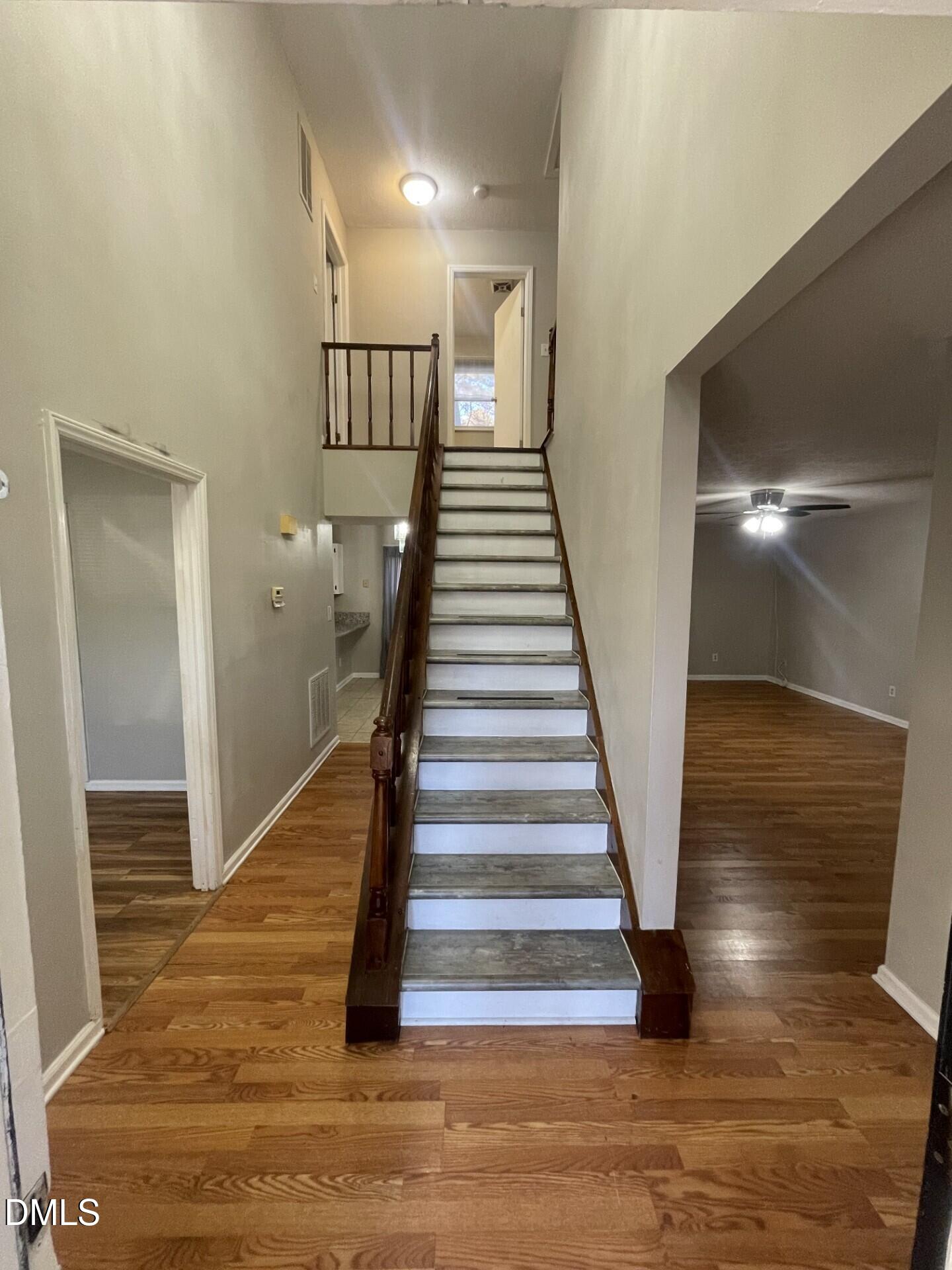 8920 Taymouth Court Raleigh, NC 27613 - Photo 3 of 20 a view of entryway and hall with wooden floor