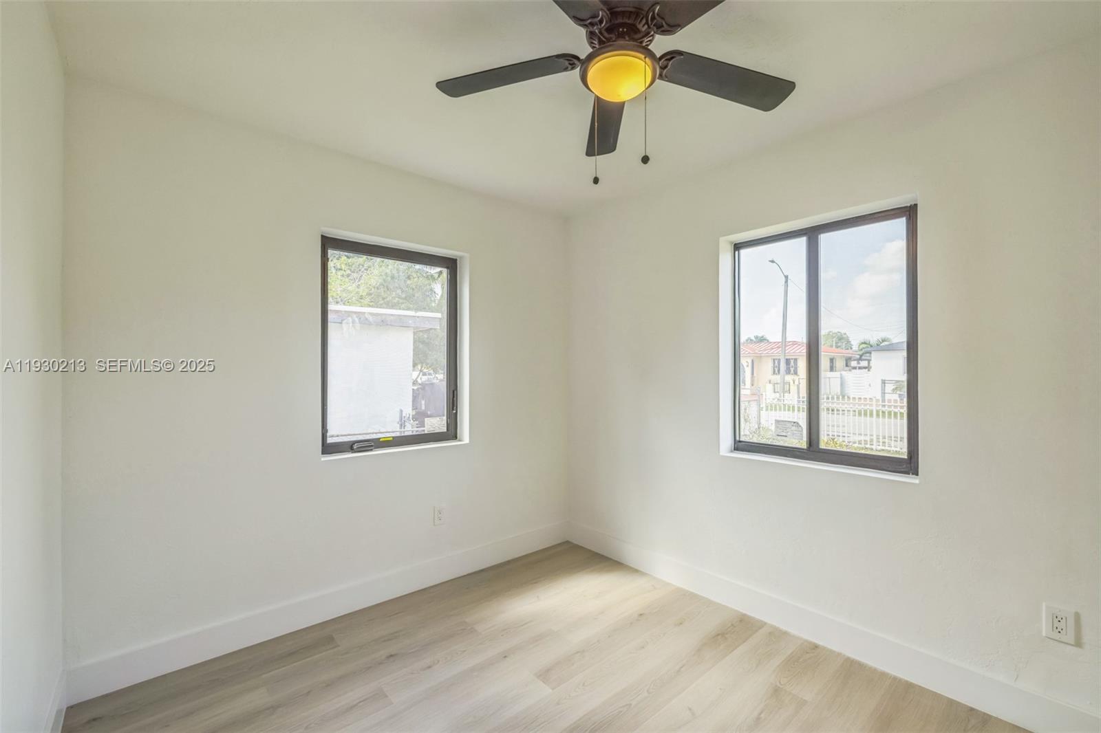 9055 Northwest 33rd Avenue Miami, FL 33147 - Photo 23 of 32 a view of an empty room and window