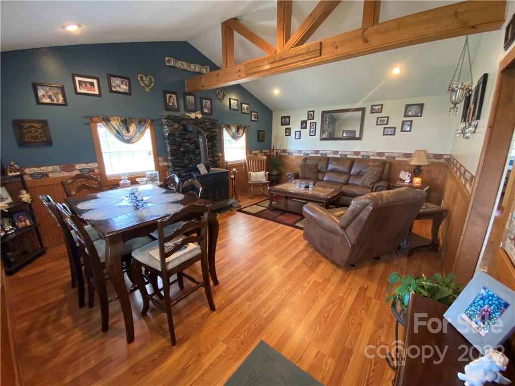 254 Landrum Road Tryon, NC 28782 - Photo 7 of 24 a living room with furniture and a wooden floor