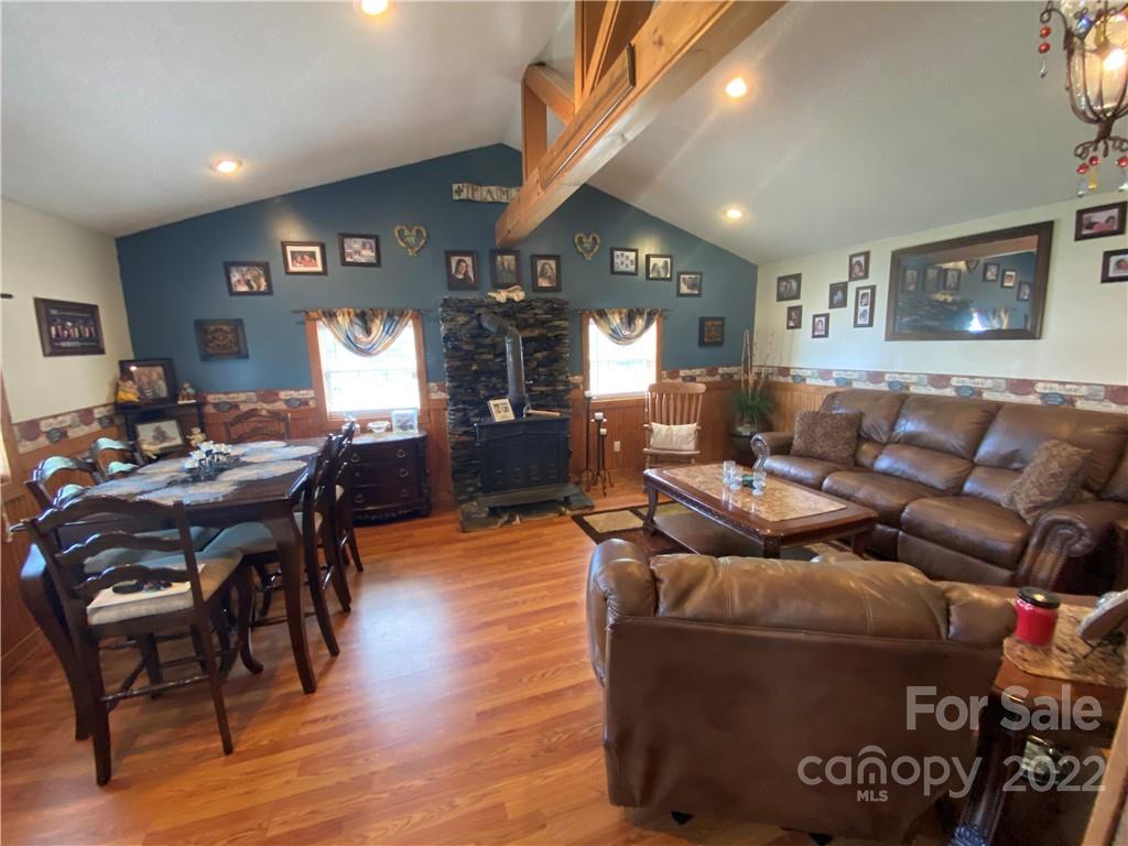 254 Landrum Road Tryon, NC 28782 - Photo 9 of 24 a living room with furniture and wooden floor