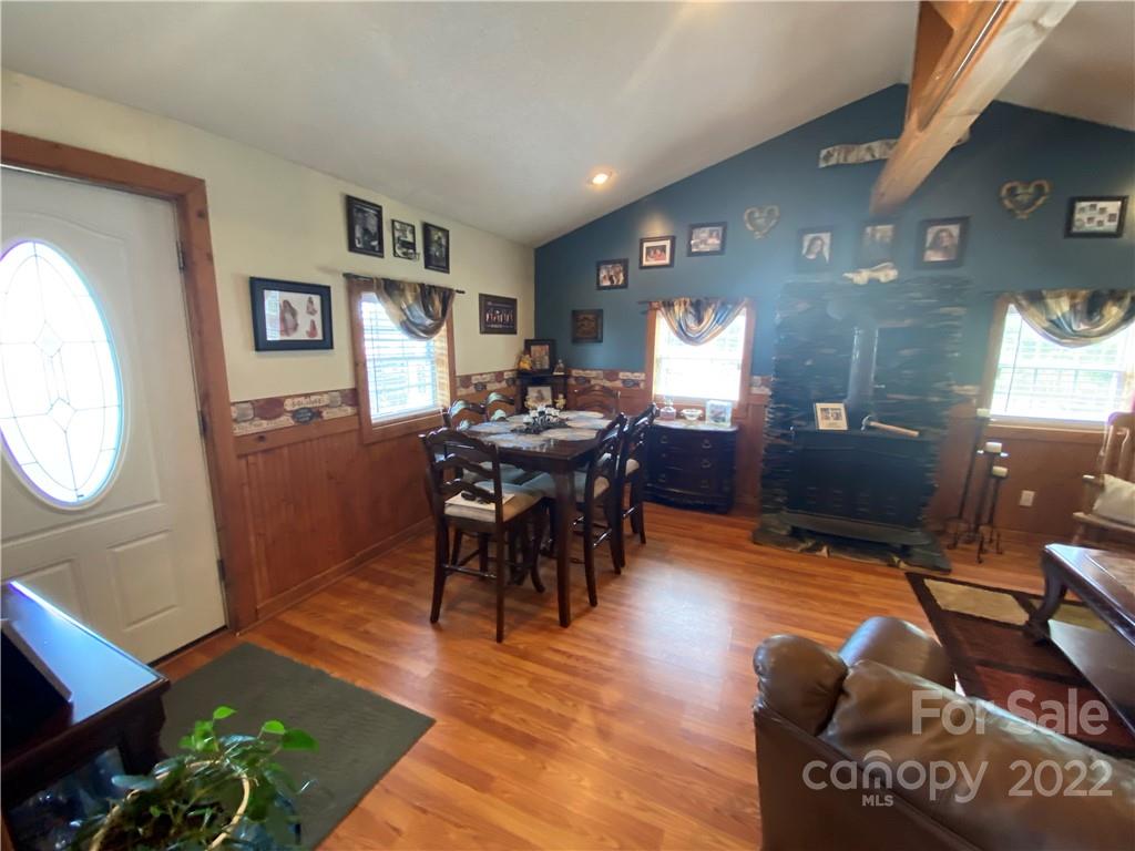254 Landrum Road Tryon, NC 28782 - Photo 10 of 24 a view of a livingroom with furniture and a window