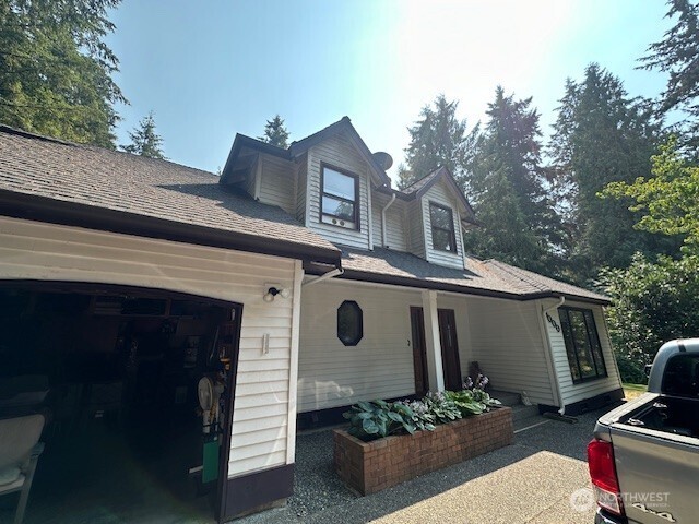 19000 Northeast Redmond Road Redmond, WA 98053 - Photo 1 of 1 a front view of a house with entryway
