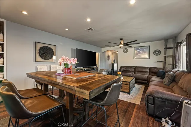 a room with furniture and a flat screen tv