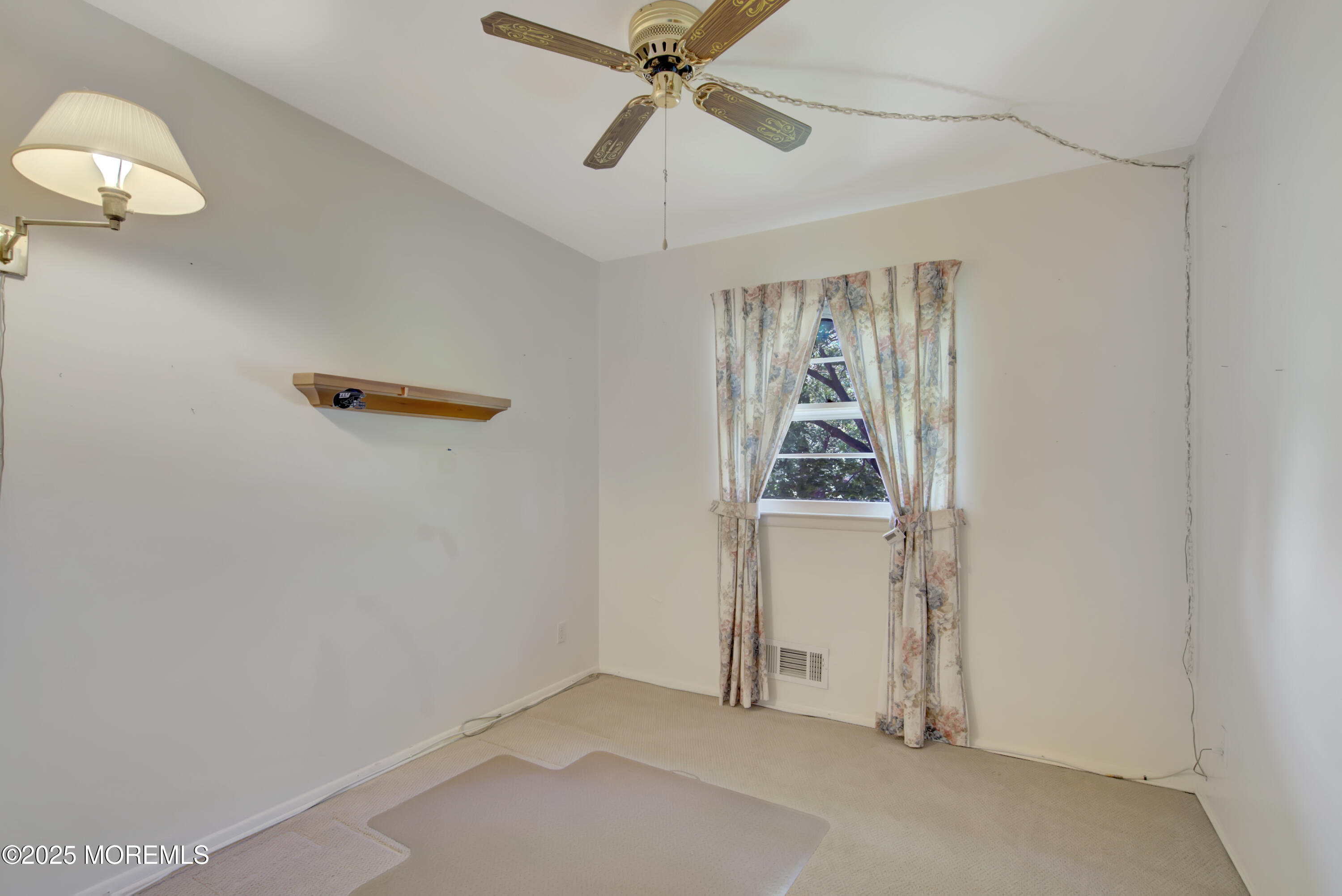 16 Burdge Drive Howell, NJ 07731 - Photo 18 of 30 a view of an empty room with a window