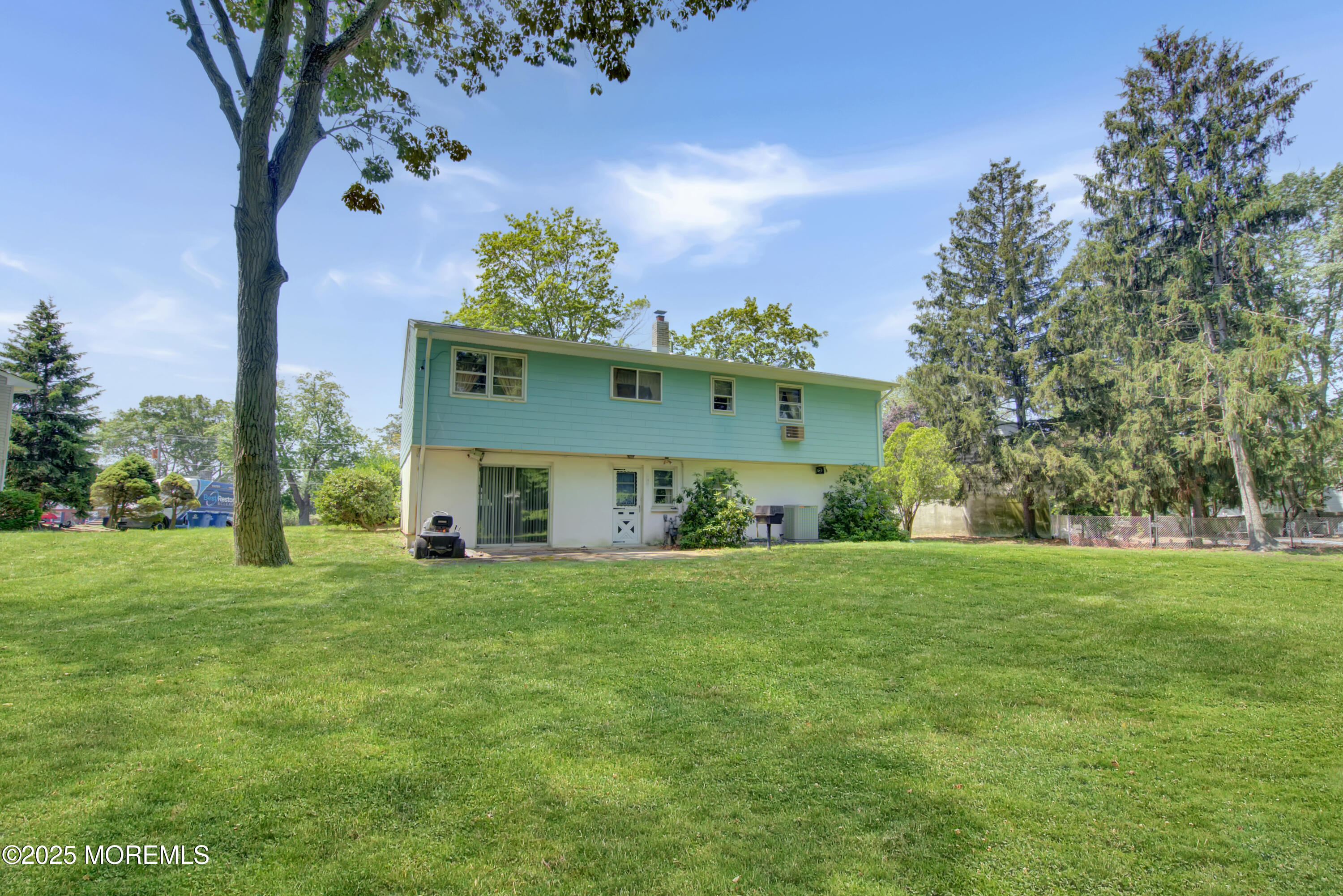 16 Burdge Drive Howell, NJ 07731 - Photo 29 of 30 a front view of a house with a yard and trees